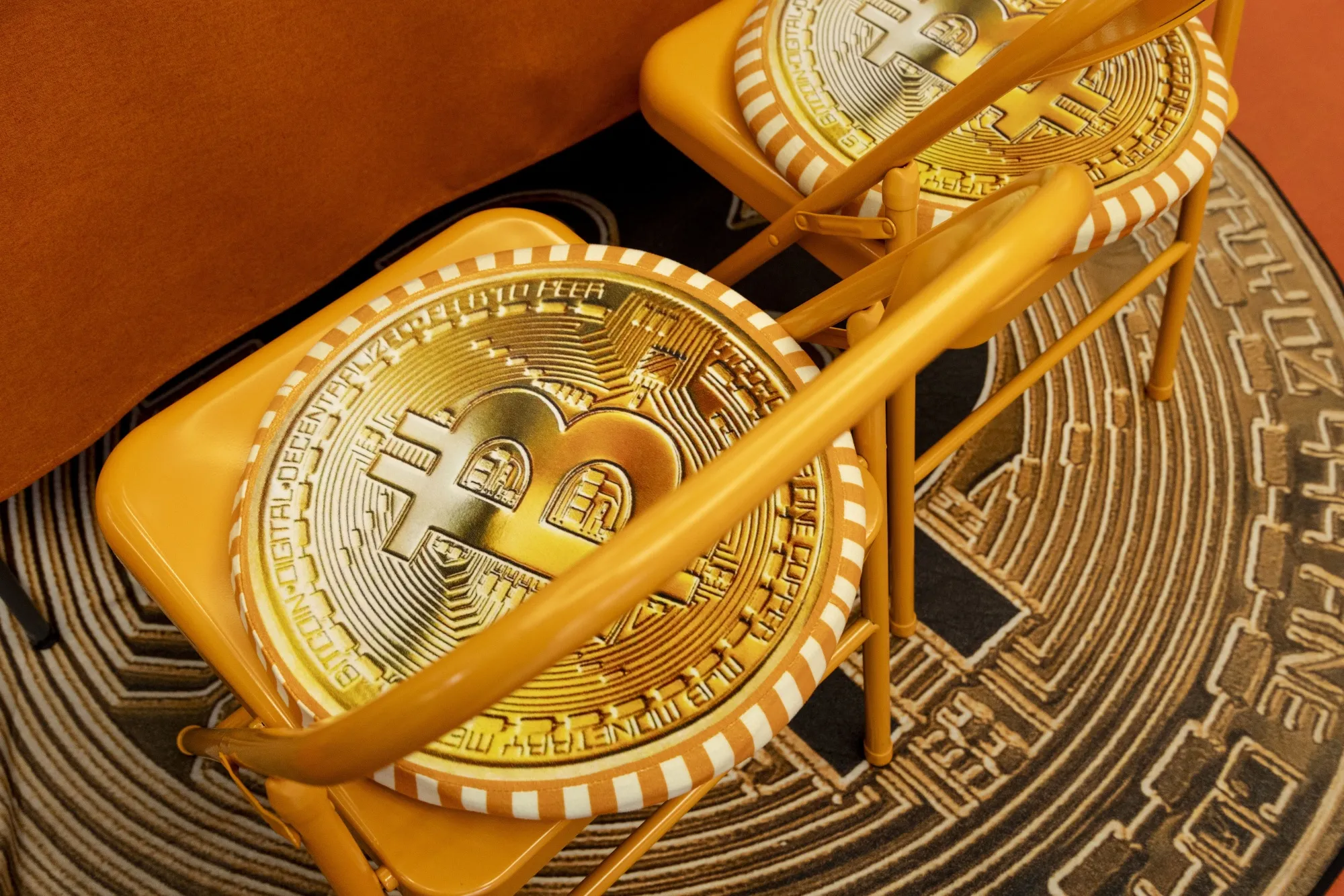 The Bitcoin logo on cushions at a Bithumb exchange office in Seoul, South Korea,&nbsp;