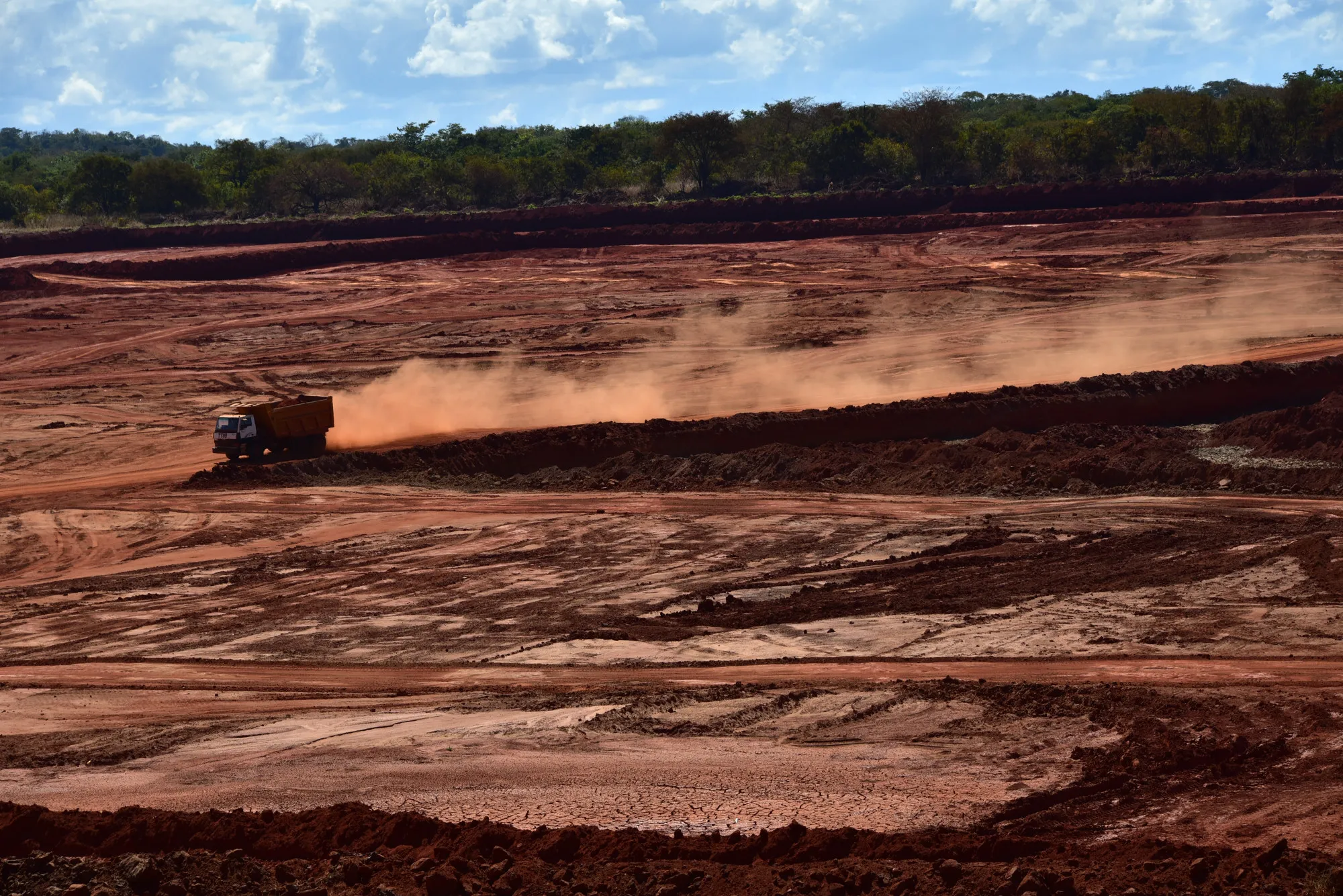 A truck travels along a mine pit at Gemfields Group Ltd.’s ruby mine&nbsp;in Mozambique.