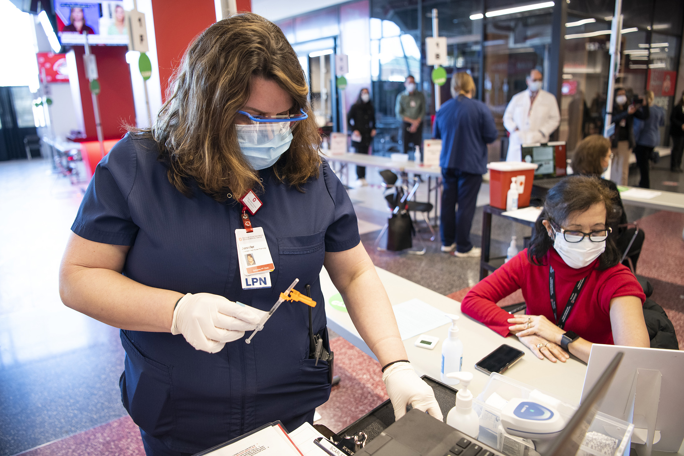 relates to Colleges Turn Arenas Into Vaccination Centers