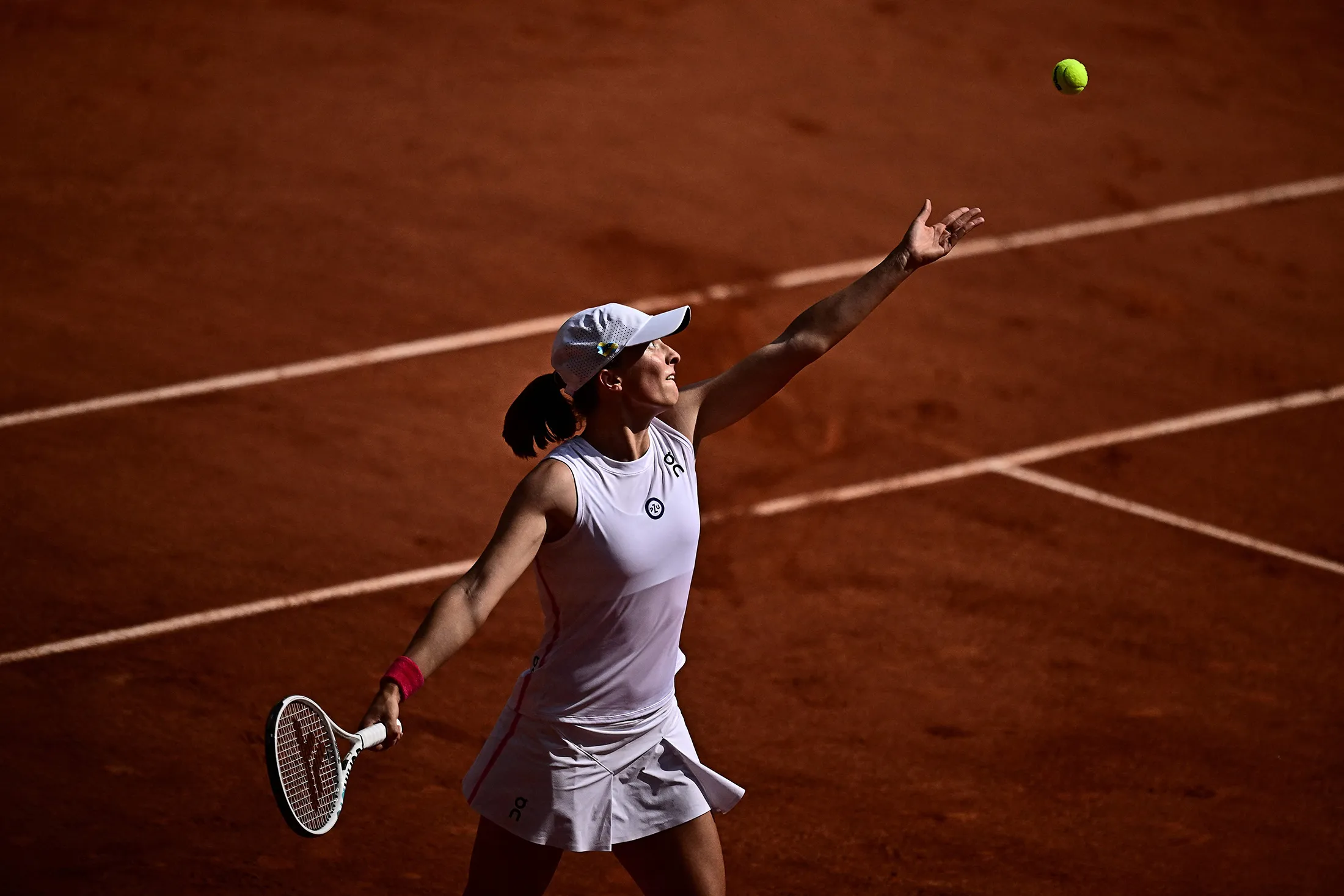 Poland's Iga Swiatek serves to Czech Republic's Karolina Muchova during their women's singles final match of the Roland-Garros Open&nbsp;in June.