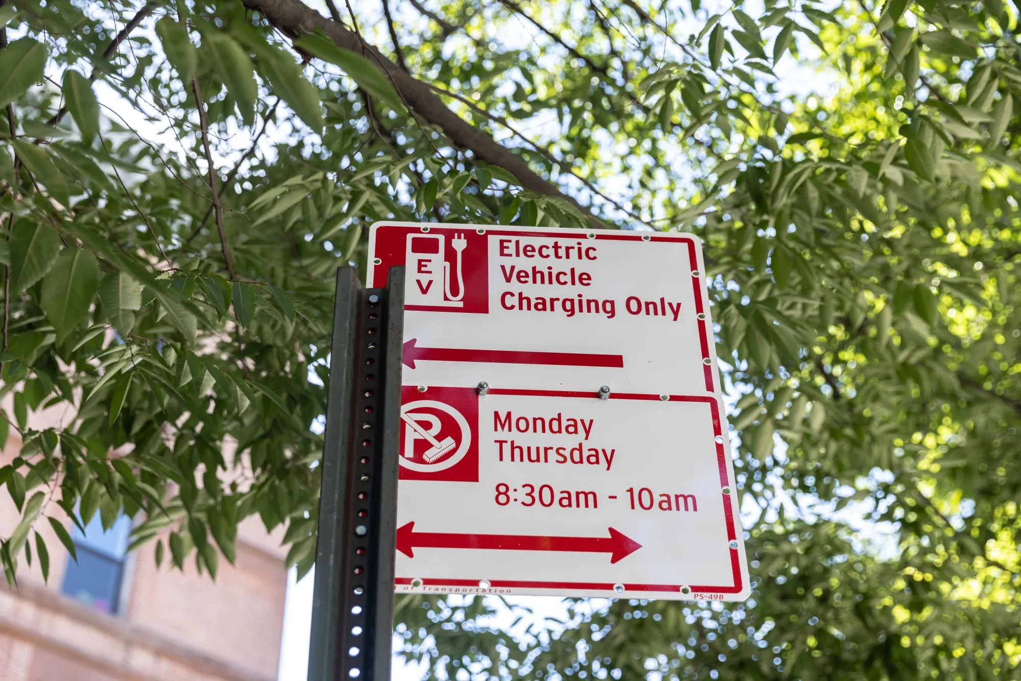 An electric-vehicle&nbsp;charging sign&nbsp;near West 84th Street in New York. The US is aiming to have 500,000 chargers by 2030.