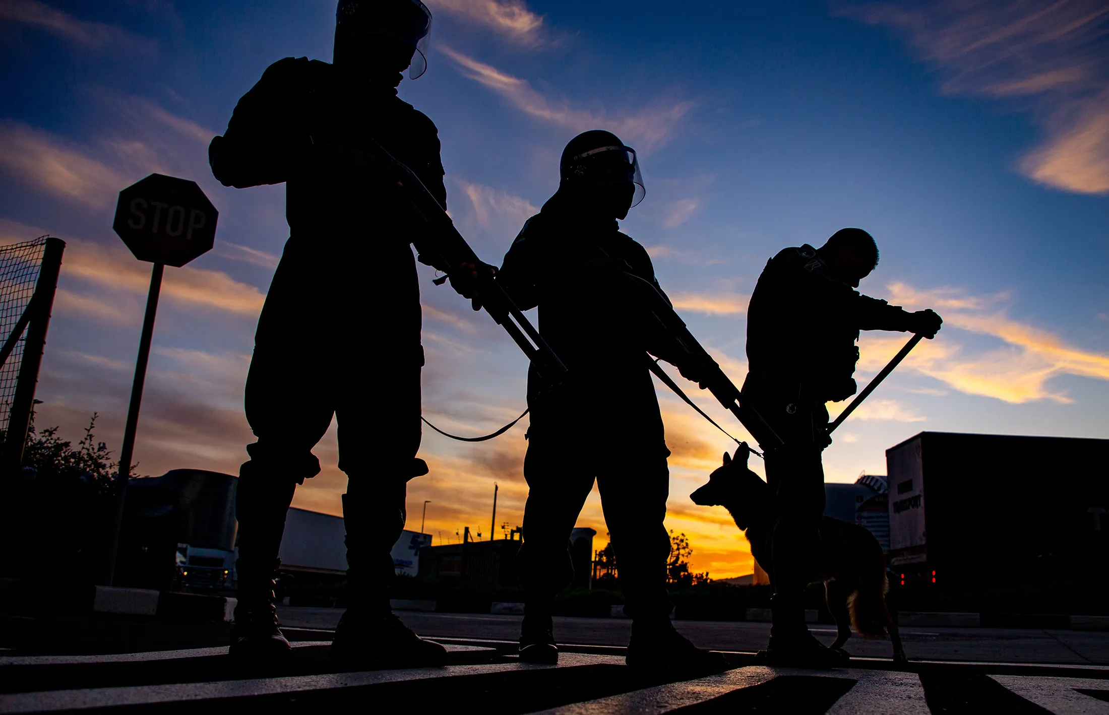 Security officers of TSU Protection Services and AM Security stand guard during the national lockdown in Cape Town, South Africa,&nbsp;on May 14.