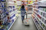 A shopper walks through a Big Bazaar hypermarket, operated by Future Retail, in Mumbai.