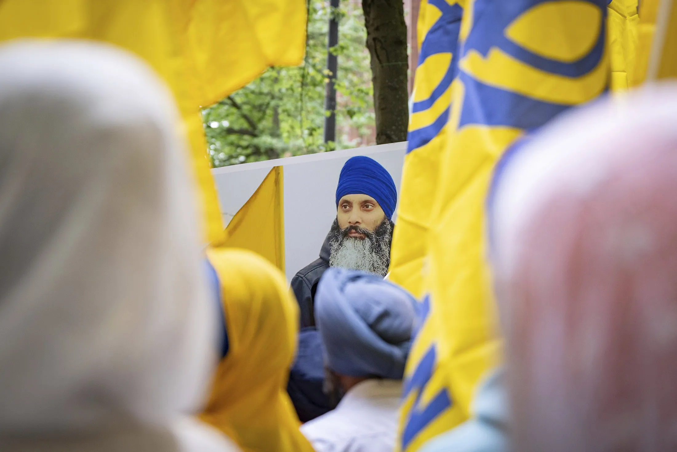 An image of Hardeep Singh Nijjar during a June protest over his killing.