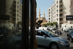 Traffic passes the Mohammad Al-Amin mosque in Beirut.