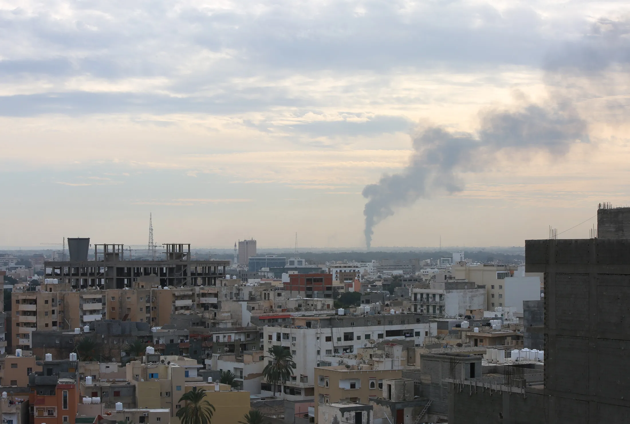 Smoke rises after forces of Khalifa Haftar attacked the capital Tripoli, Libya on Jan.&nbsp;19.
