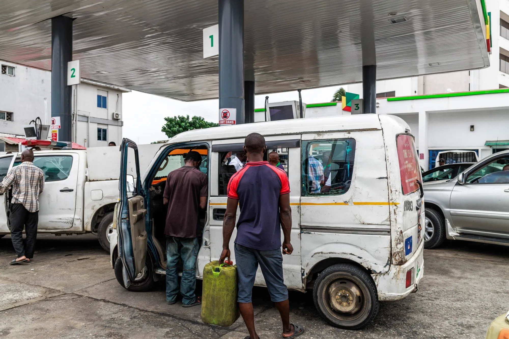 A customers at a filling station in Lagos.