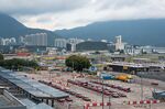 Designated taxis for Covid-19 patients and travelers heading into quarantine queue at Hong Kong International Airport on Aug. 8.