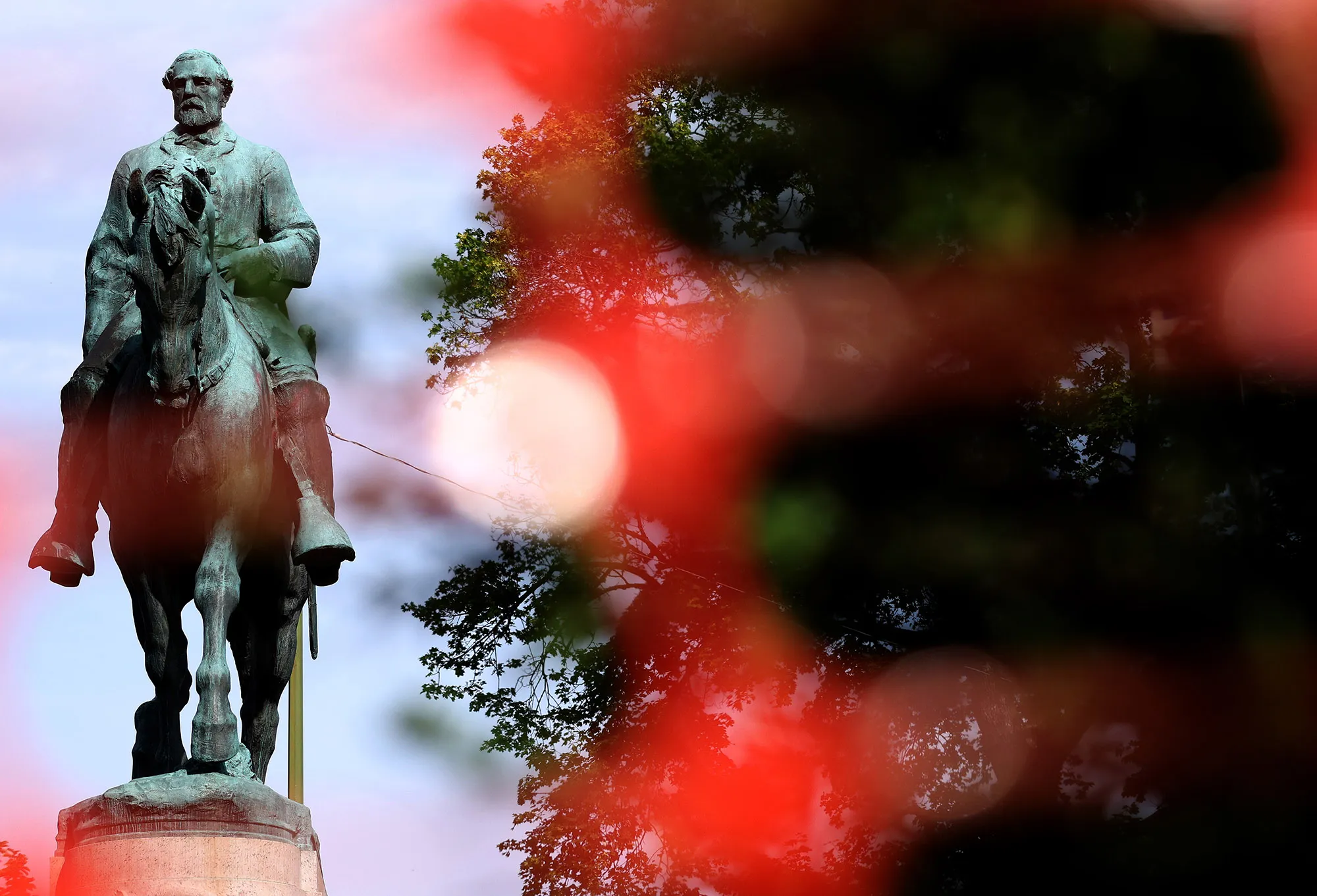 A statue of Confederate Gen. Robert E. Lee is shown in Market Street Park July 9, 2021 in Charlottesville, Virginia. Charlottesville’s City Council voted unanimously this week to appropriate $1 million for the removal, covering or storage of the statue, in addition to two other statues, one of Confederate Gen. Thomas “Stonewall” Jackson and one of Meriwether Lewis, William Clark and Shoshone interpreter Sacagawea.&nbsp;