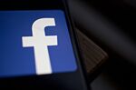 Facebook App And Logo As Crisis Reignites Washington Scrutiny Of Social Networks