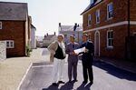 Prince Charles surveys&nbsp;plans for Poundbury, an experimental community he helped design, with planner Léon Krier (left) and developer Andrew Hamilton in&nbsp;1999.
