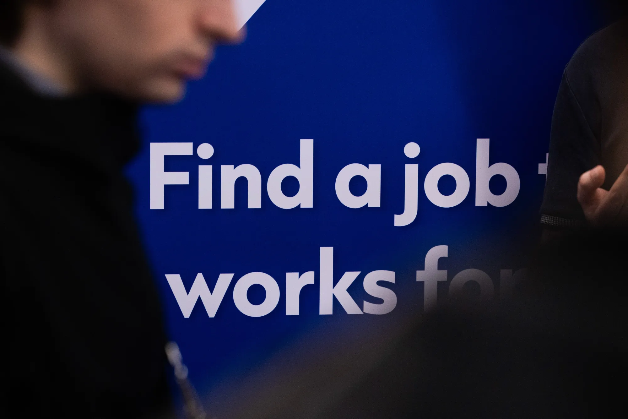 A sign advertising jobs at the UK Careers Fair in London.
