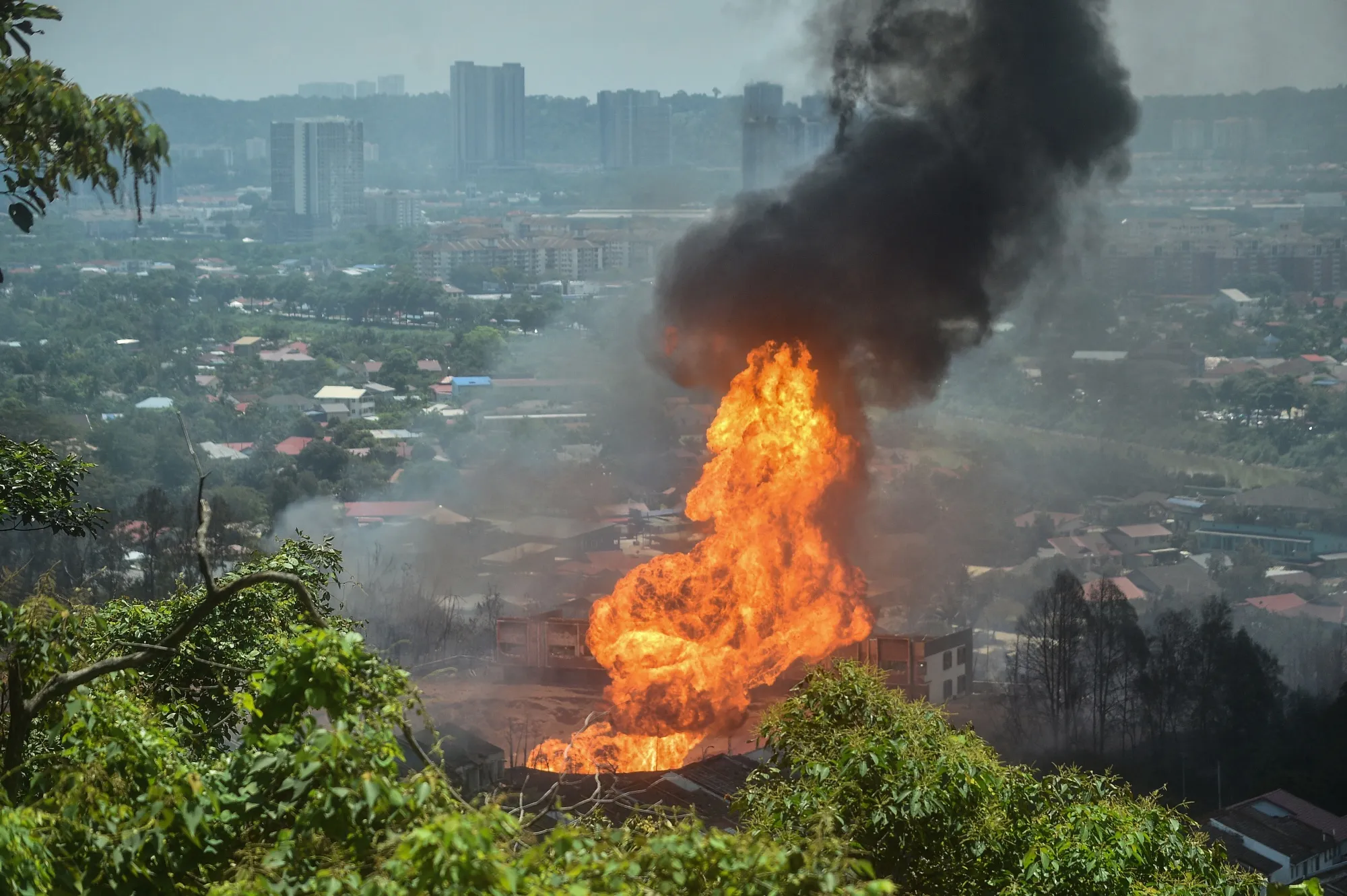 Smoke rises from a fire caused by a gas pipeline leak in Selangor on April 1.