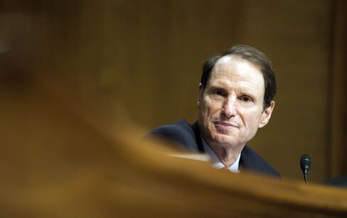 Baucus Exit Slows Tax Revamp as Wyden Rises to Advance Plan