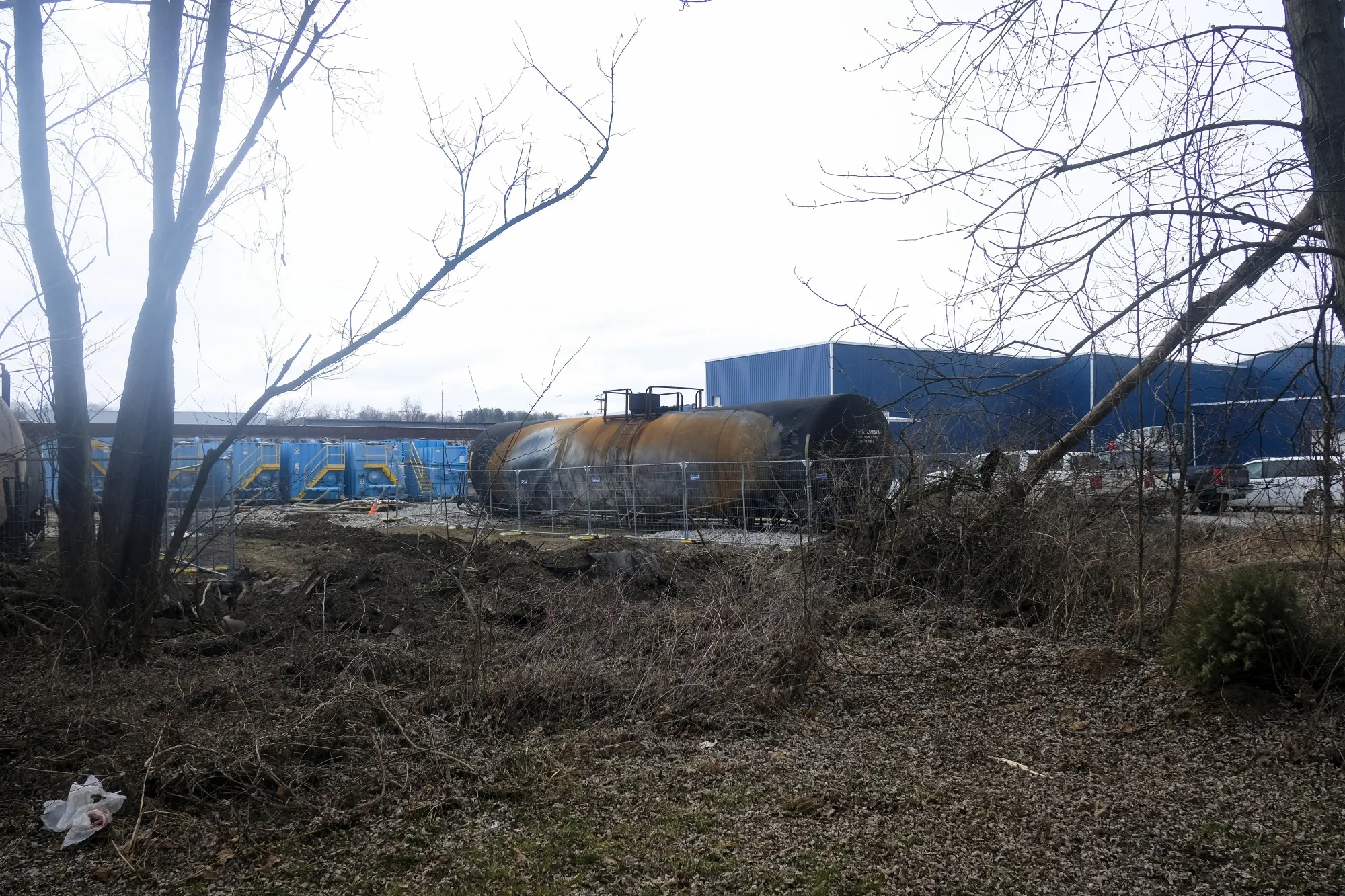 Wreckage from the Norfolk Southern train derailment near the backyard of a resident's home in East Palestine, Ohio, on Feb. 19, 2023.
