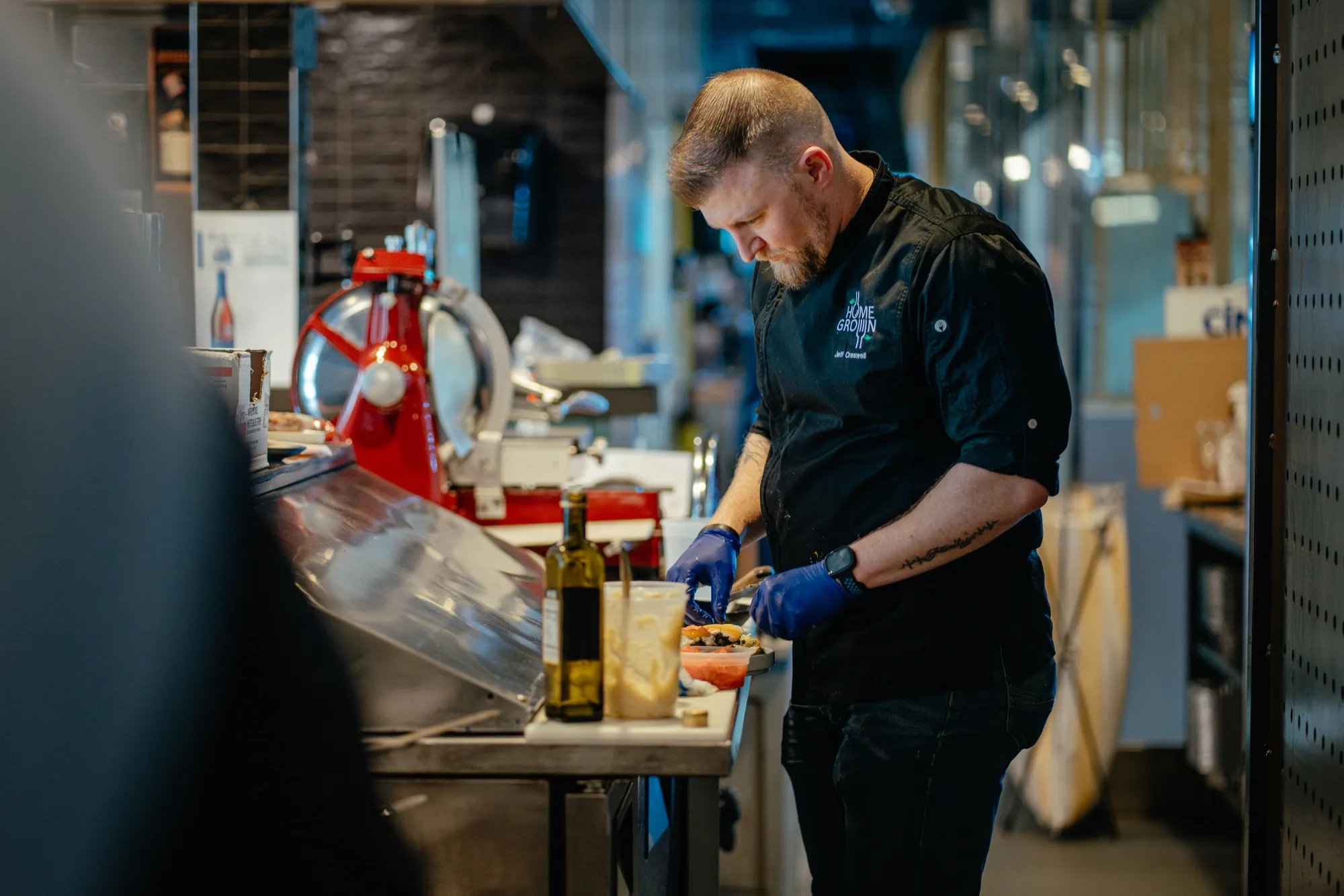 Jeff Creswell prepares dishes featuring local ingredients for a tasting at Sysco’s test kitchen in Chicago.