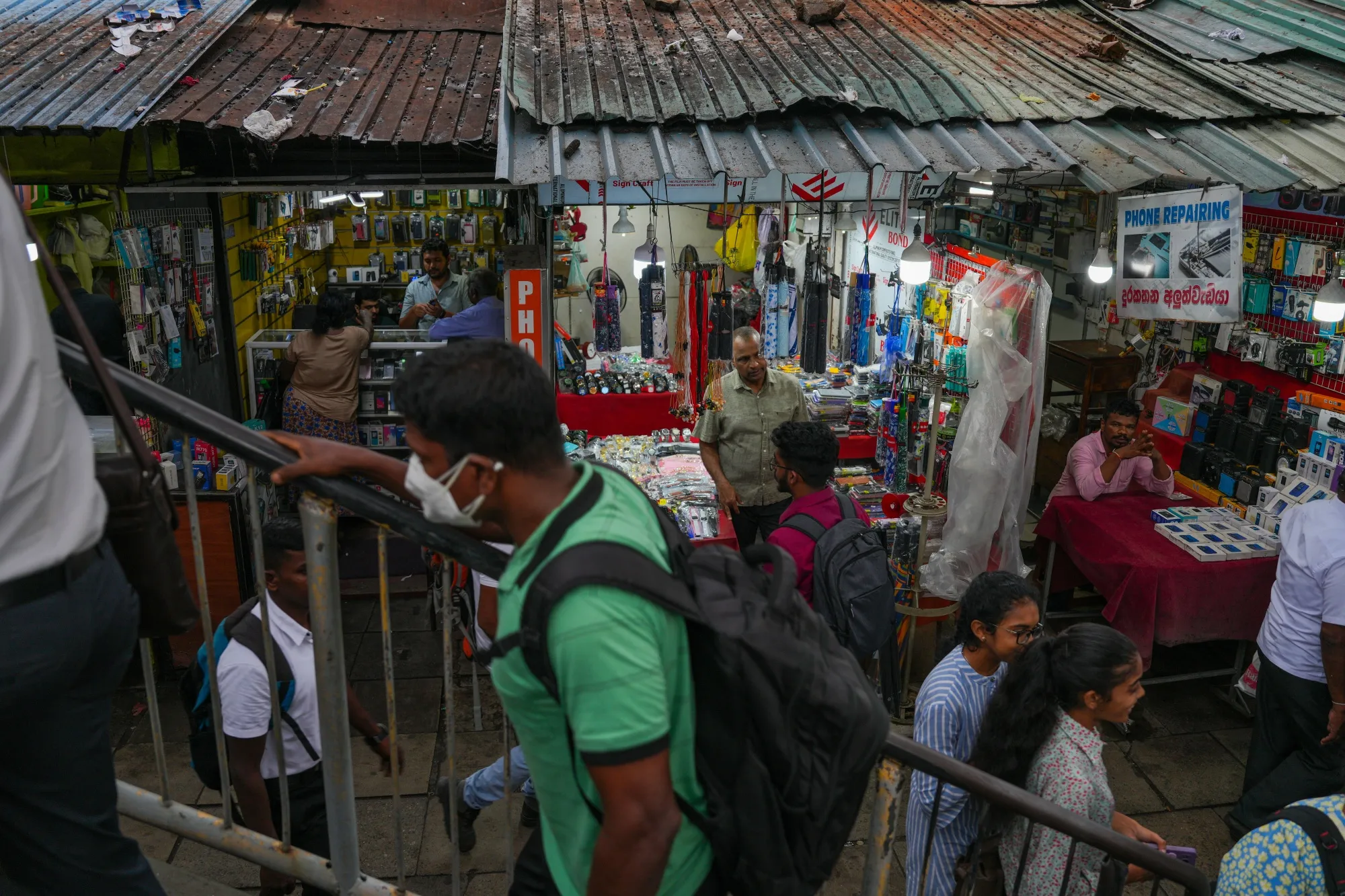 Street vendors wait for customers in Colombo, Sri Lanka.