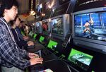 Visitors play&nbsp;on Xbox&nbsp;consoles during the annual Tokyo Game Show in Makuhari, Tokyo, Japan on Oct. 14,&nbsp;2001.&nbsp;