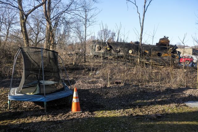 The remnants of a train car near the backyard of William Hugar's home on Taggart Street 200 yards from the site of the train derailment in East Palestine, Ohio on February 19, 2023. 