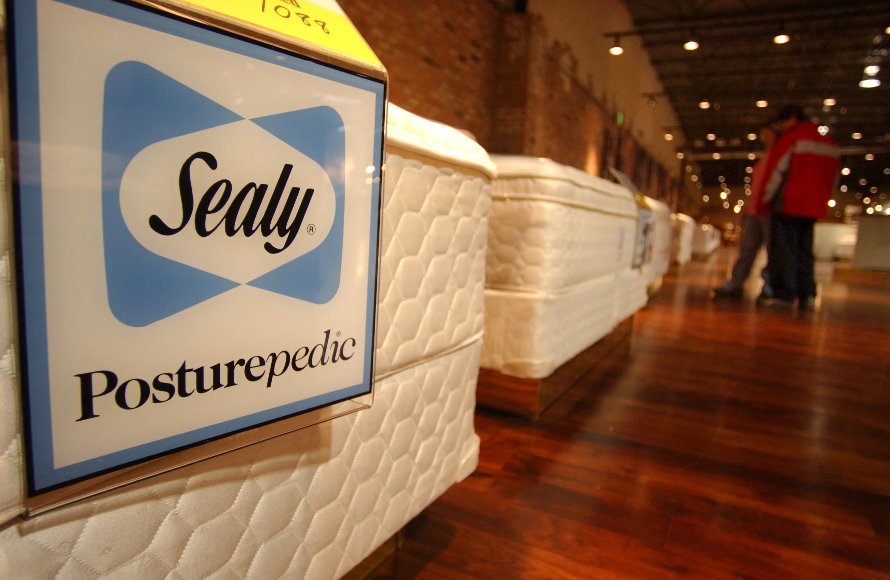 A Selection Of Sealy Beds Sit On Display