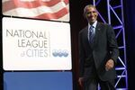 President Barack Obama arrives to deliver remarks at the National League of Cities annual Congressional City Conference in Washington, March 9, 2015. 