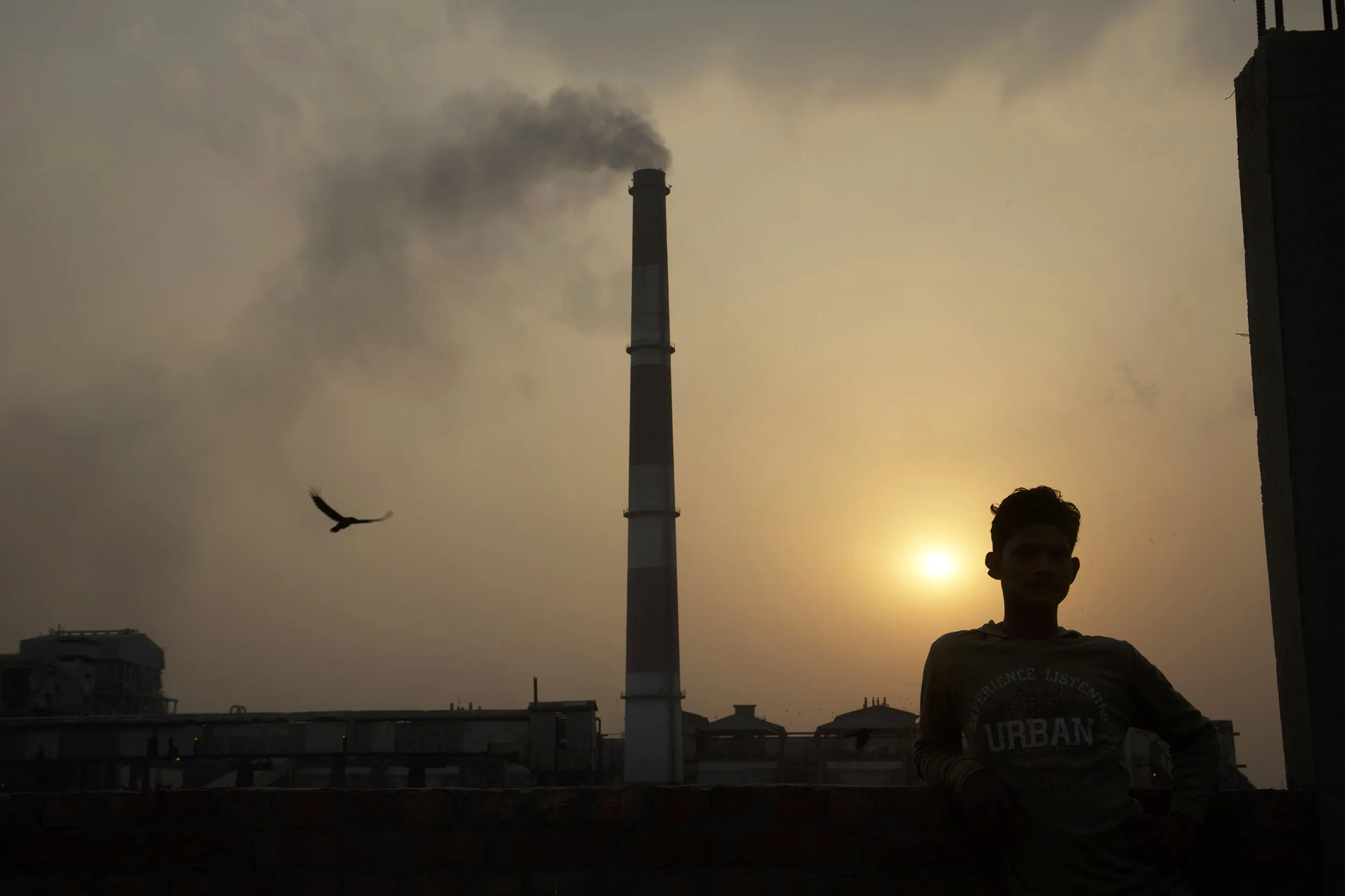 Emissions billow from a smokestack in New Delhi.
