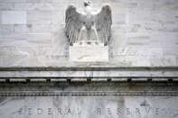 Federal Reserve Lowers Key Rate By Three Quarters Of A Point