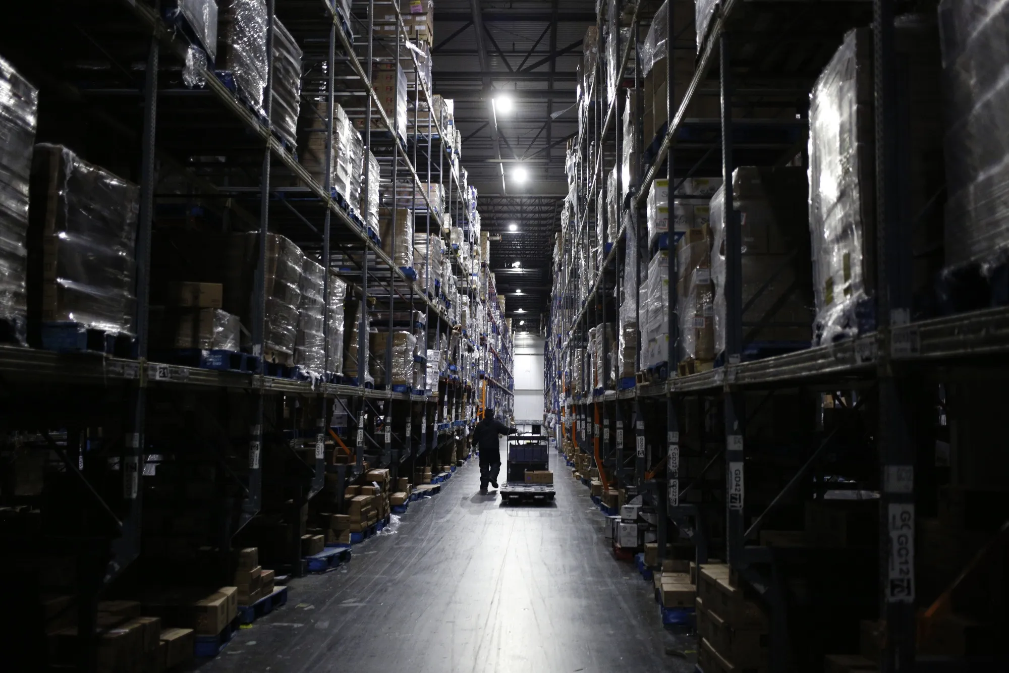 Worker at a U.S. distribution center during lockdown.