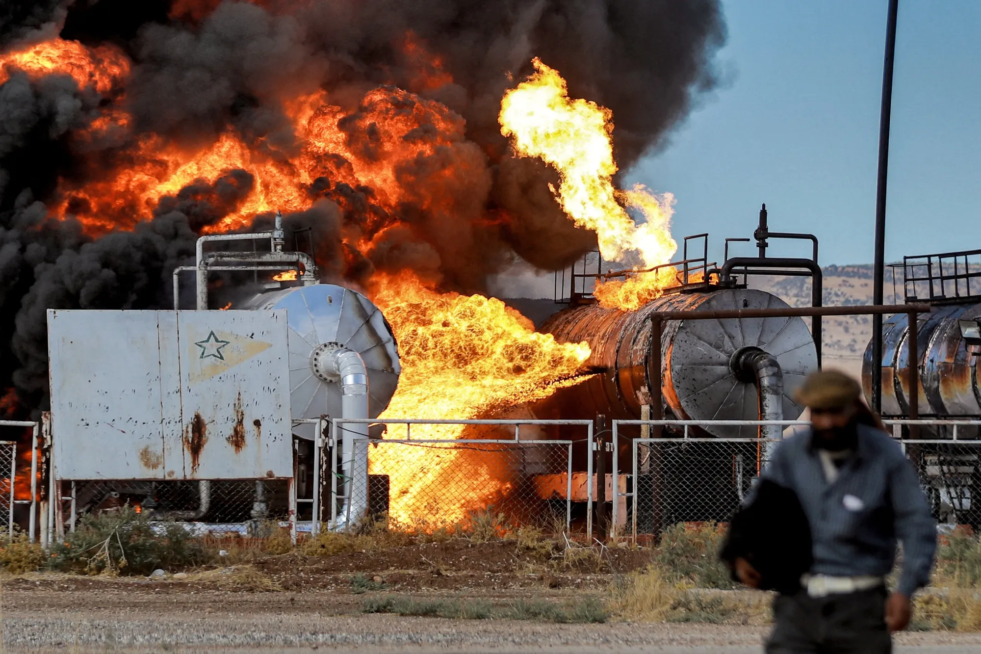 A fire raging at the Zarba oil facility following Turkish strikes&nbsp;in the Kurdish-controlled region of Hasake, on Oct. 5.