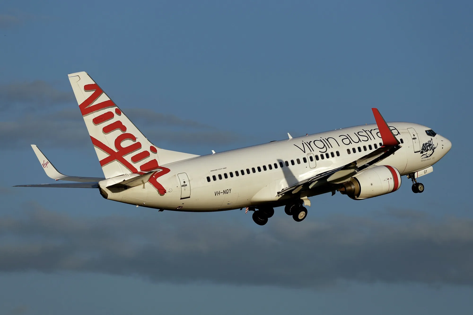A Virgin Australia plane takes off at Sydney Airport.