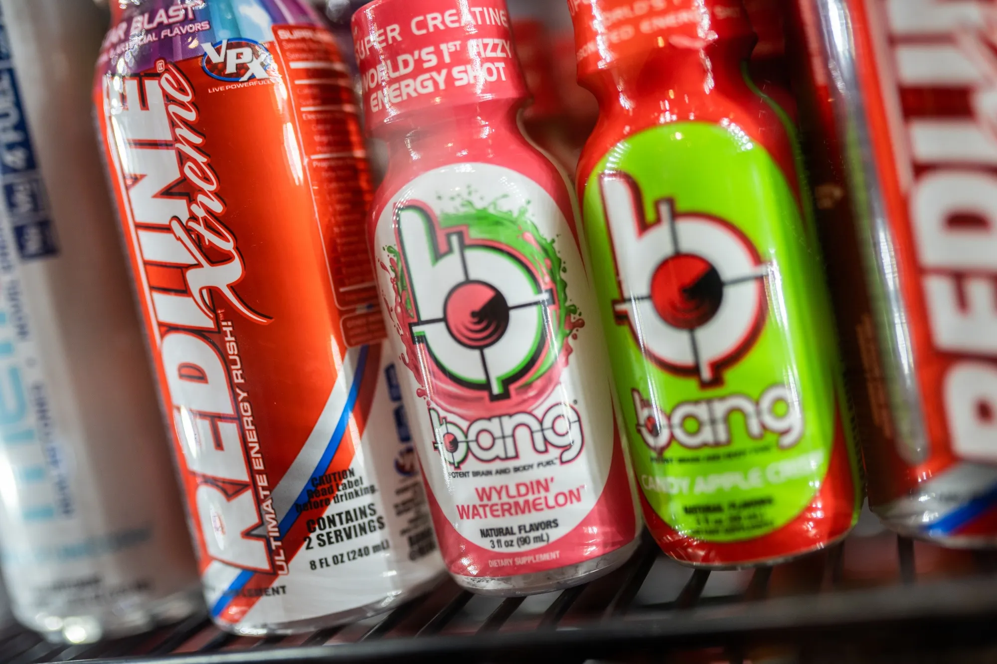 A fridge full of energy drinks.