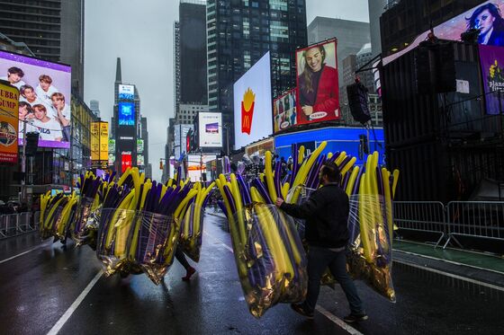 As Times Square Ball Drops, Mild Temperatures and Chance of Rain