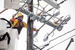 A worker repairs a power line in Austin, Texas, on&nbsp;Feb. 18.&nbsp;