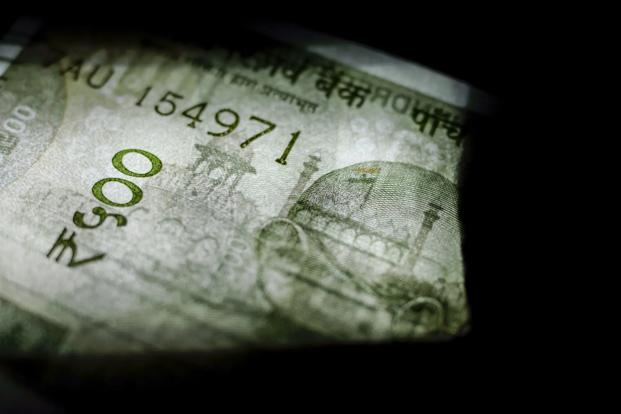 An Indian five hundred rupee banknote is arranged for a photograph in Mumbai, India, on Sunday, Jan. 29, 2017. Reviving India's growth and boosting demand are essential as gross domestic product is likely to grow 7.1 percent in the year through March, the slowest pace in three years -- and this is before considering the impact of currency shortages in an economy where 98 percent of consumer payments are made in cash.