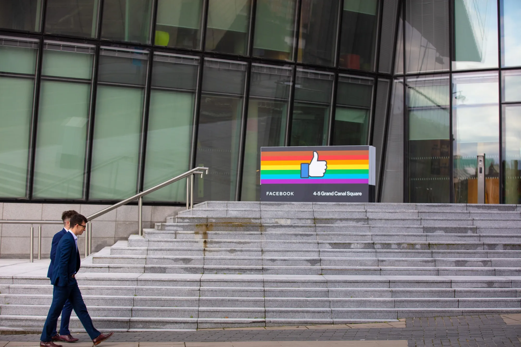 Pedestrians pass the Facebook European headquarters in Dublin.