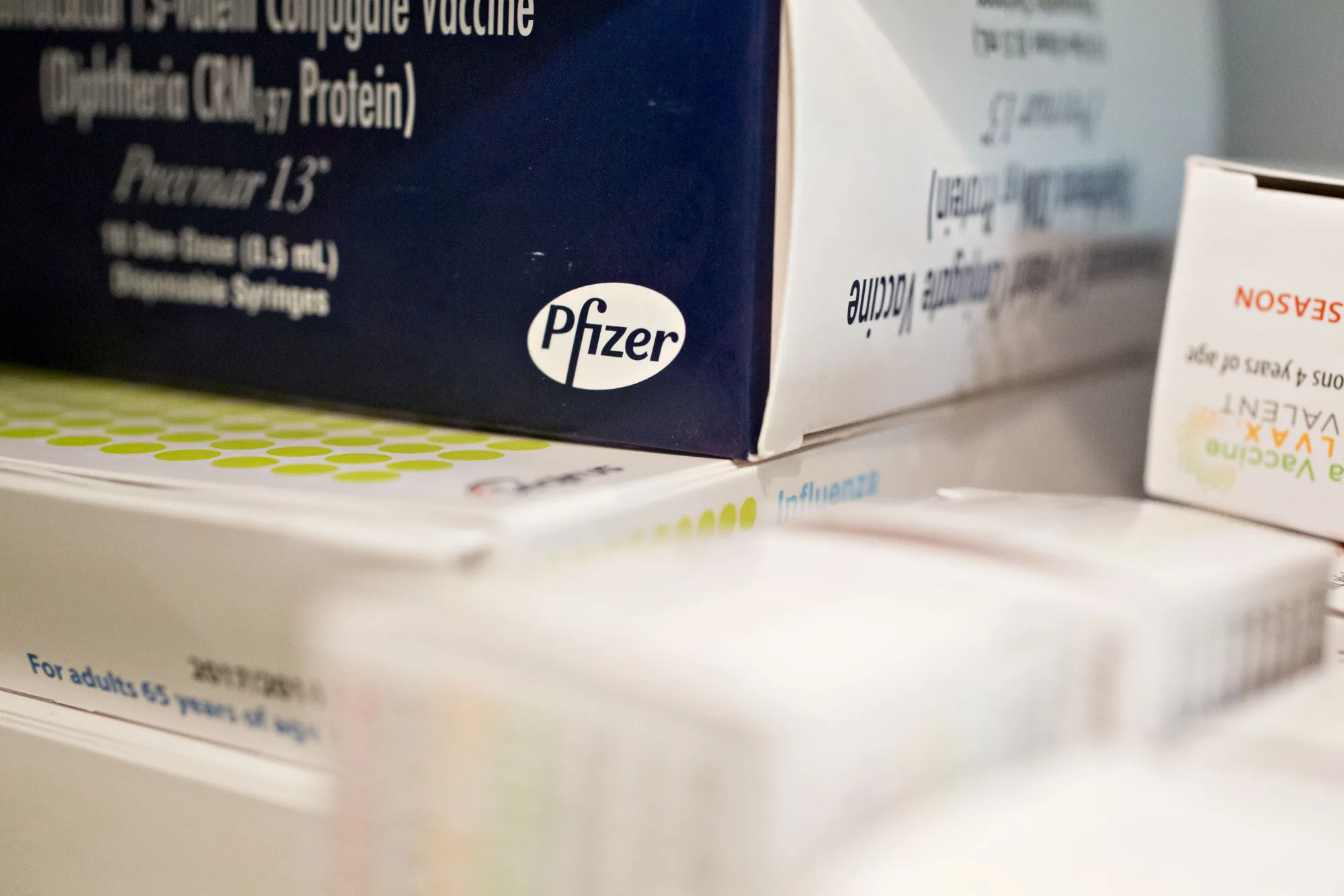 Signage is seen on a box of Pfizer Inc. Prevnar 13 vaccine syringes at a pharmacy in Princeton, Illinois, U.S., on Monday, Oct. 23, 2017. Pfizer Inc. is scheduled to release earnings figures on October 31.