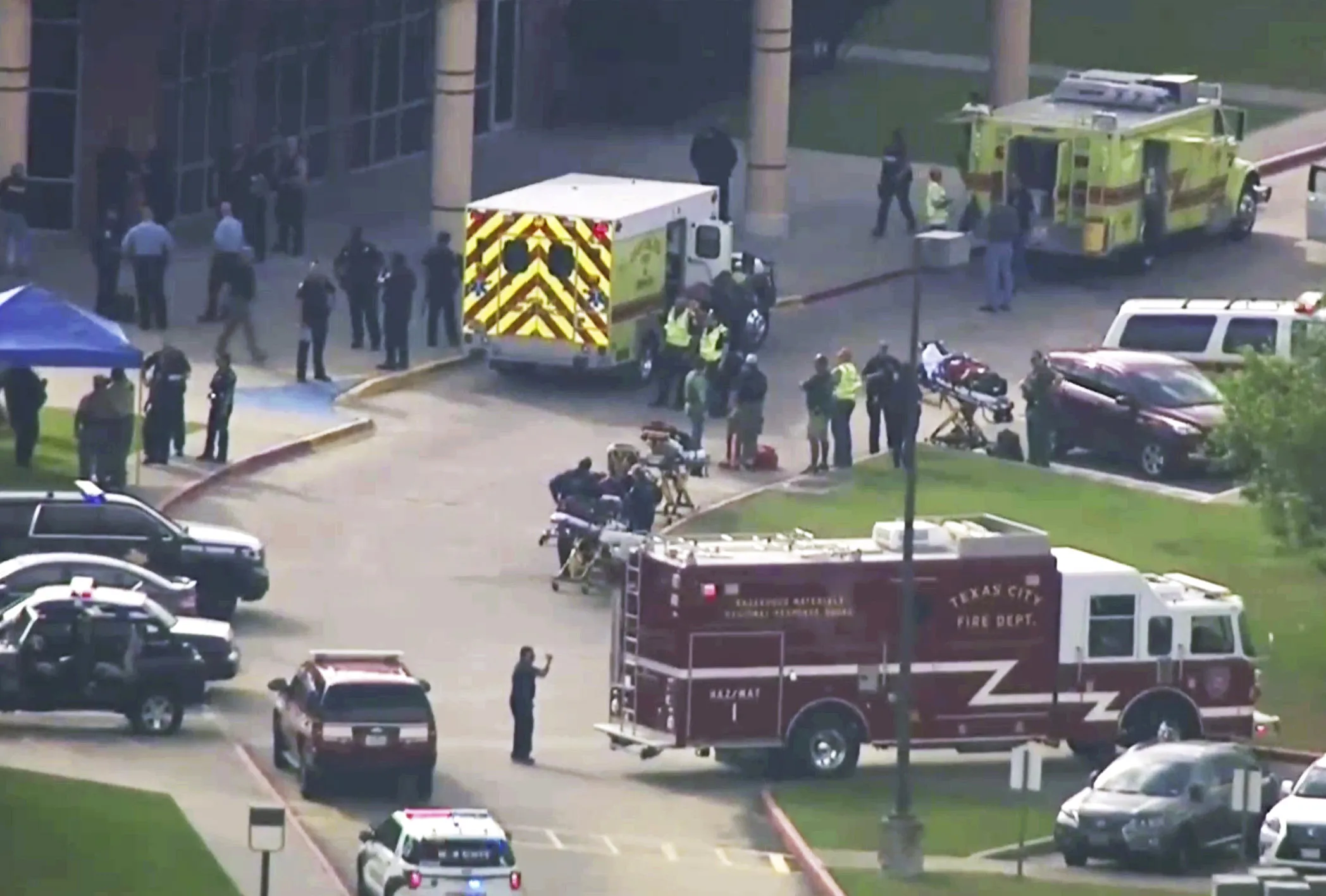 In this image taken from video emergency personnel and law enforcement officers respond to a high school near Houston after an active shooter was reported on campus&nbsp;in Santa Fe, Texas on&nbsp;May 18, 2018.