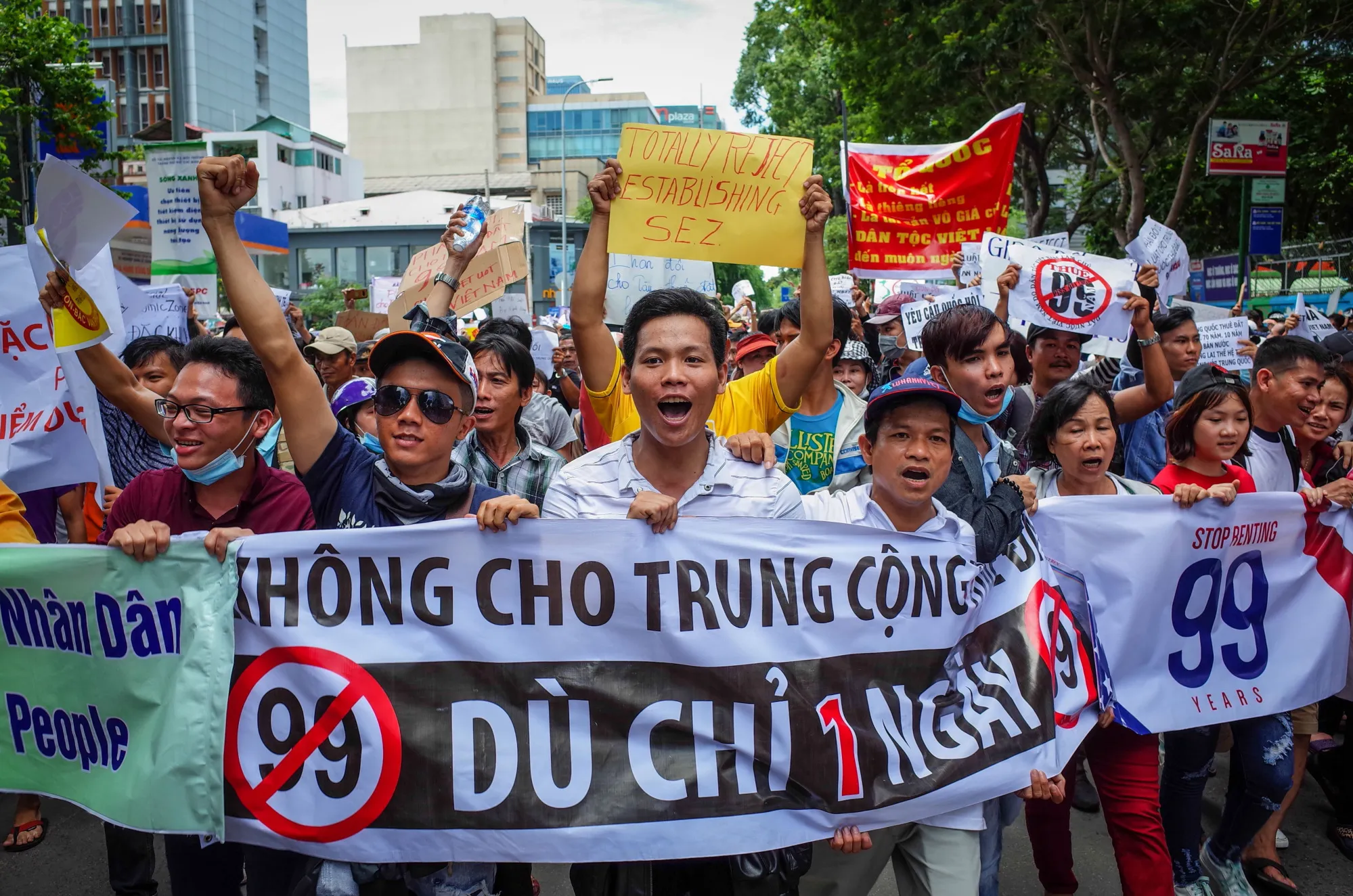 Vietnamese protesters shout slogans&nbsp;during a demonstration in Ho Chi Minh City on June 10.