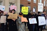 Protesters gather outside D.C.'s Jefferson Middle School on Friday, Feb. 10, 2017, where Education Secretary Betsy DeVos was scheduled to appear.