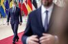 Emmanuel Macron arrives to speak to the media during the EU summit in Brussels, on Oct. 15
