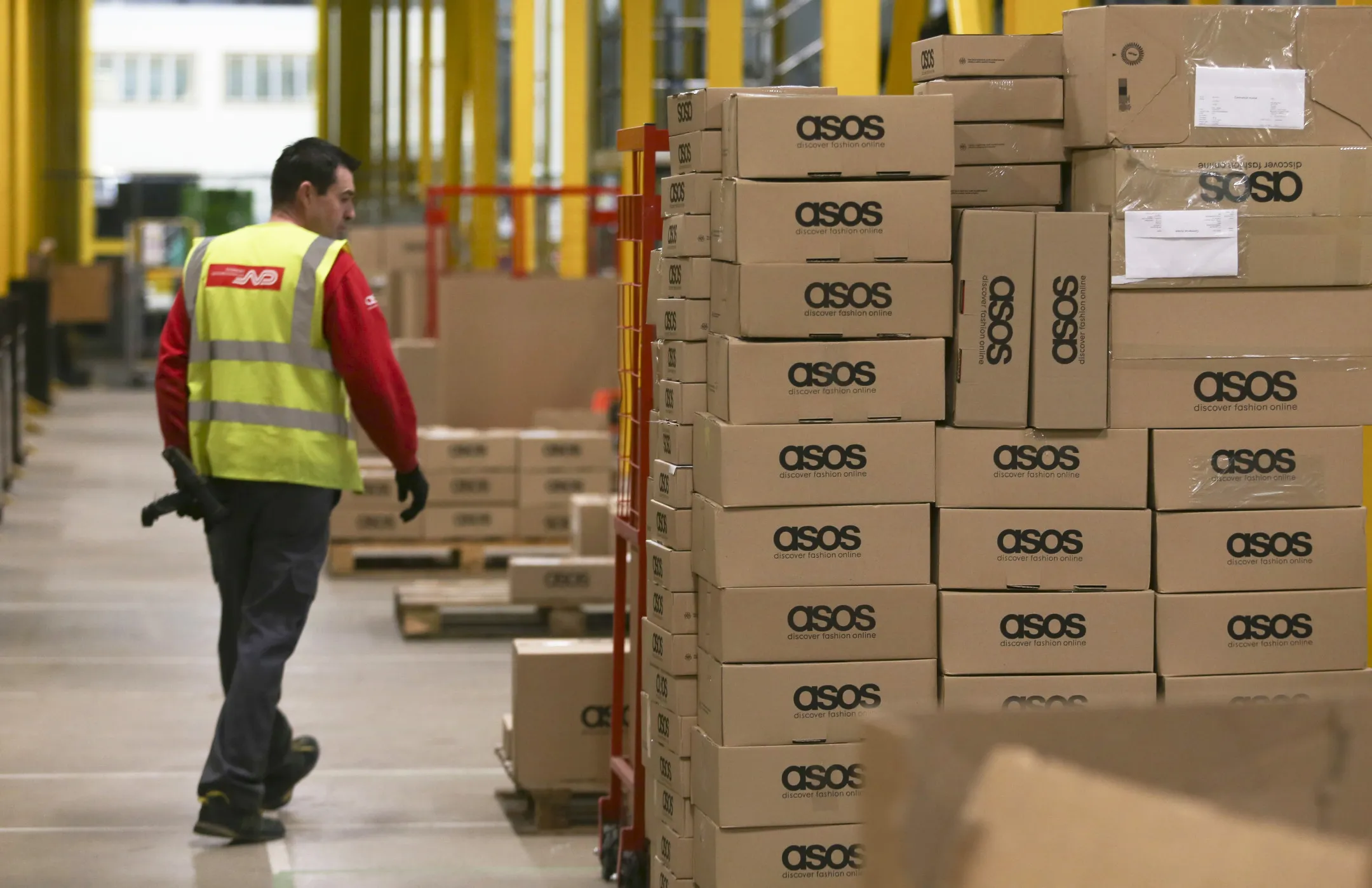 Boxes of completed orders at Asos Plc's distribution warehouse in Barnsley.