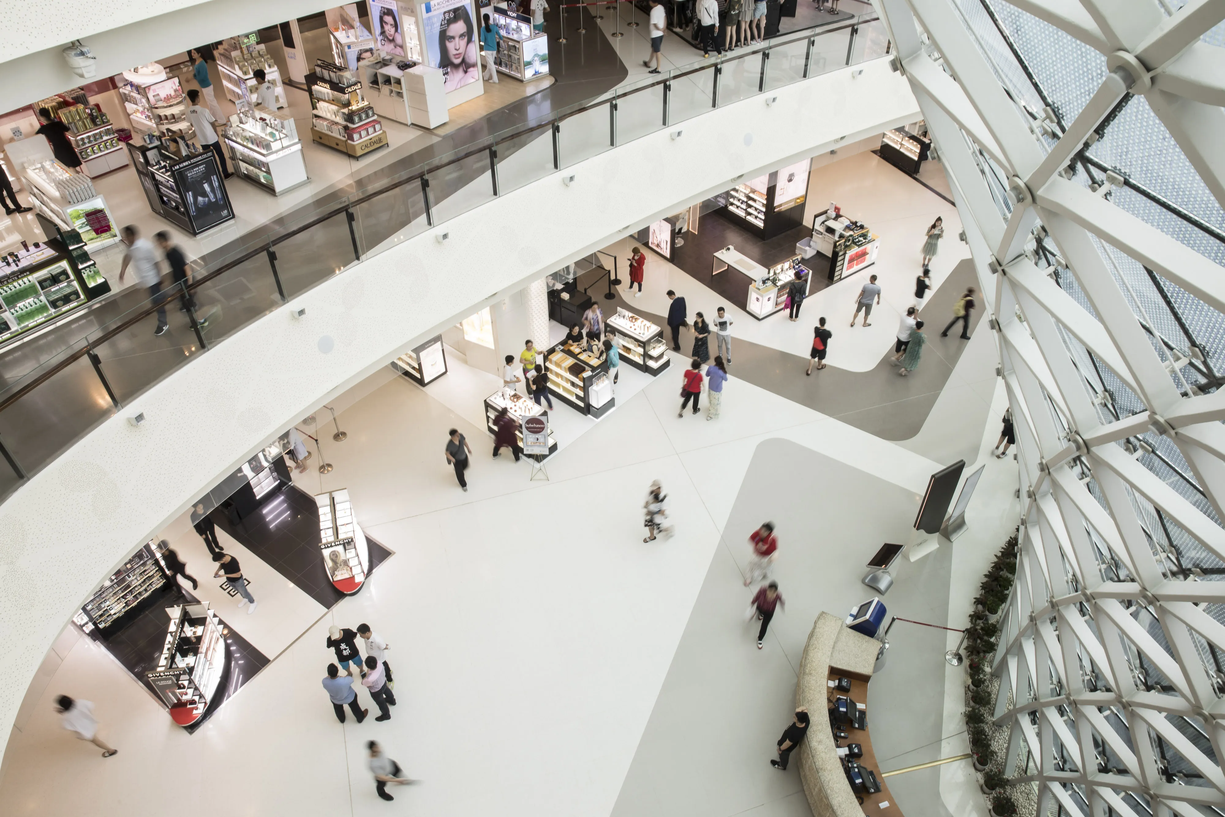 Shoppers walk through the CDF Mall&nbsp;in Sanya, Hainan province, China.