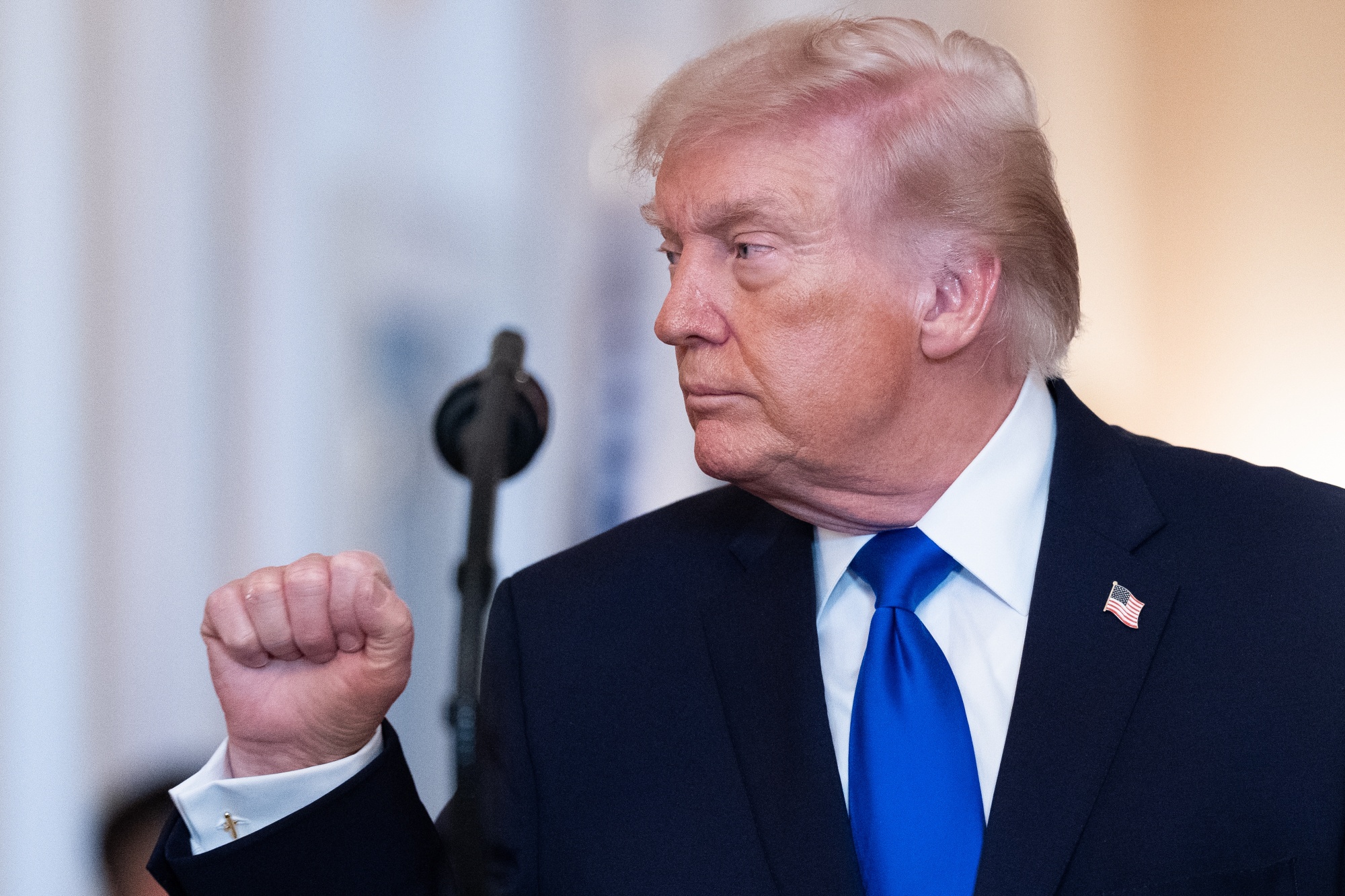 US President Donald Trump during an angel families remembrance ceremony in the East Room of the White House in Washington, DC, US, on Monday, Feb. 23, 2026. President Donald Trump threatened higher tariffs on goods from countries that "play games" with their existing US trade agreements following the Supreme Court's decision quashing his global duties. Photographer: Aaron Schwartz/CNP/Bloomberg