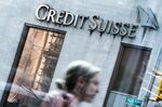 A pedestrian walks past the Credit Suisse Group AG headquarters in New York, U.S.