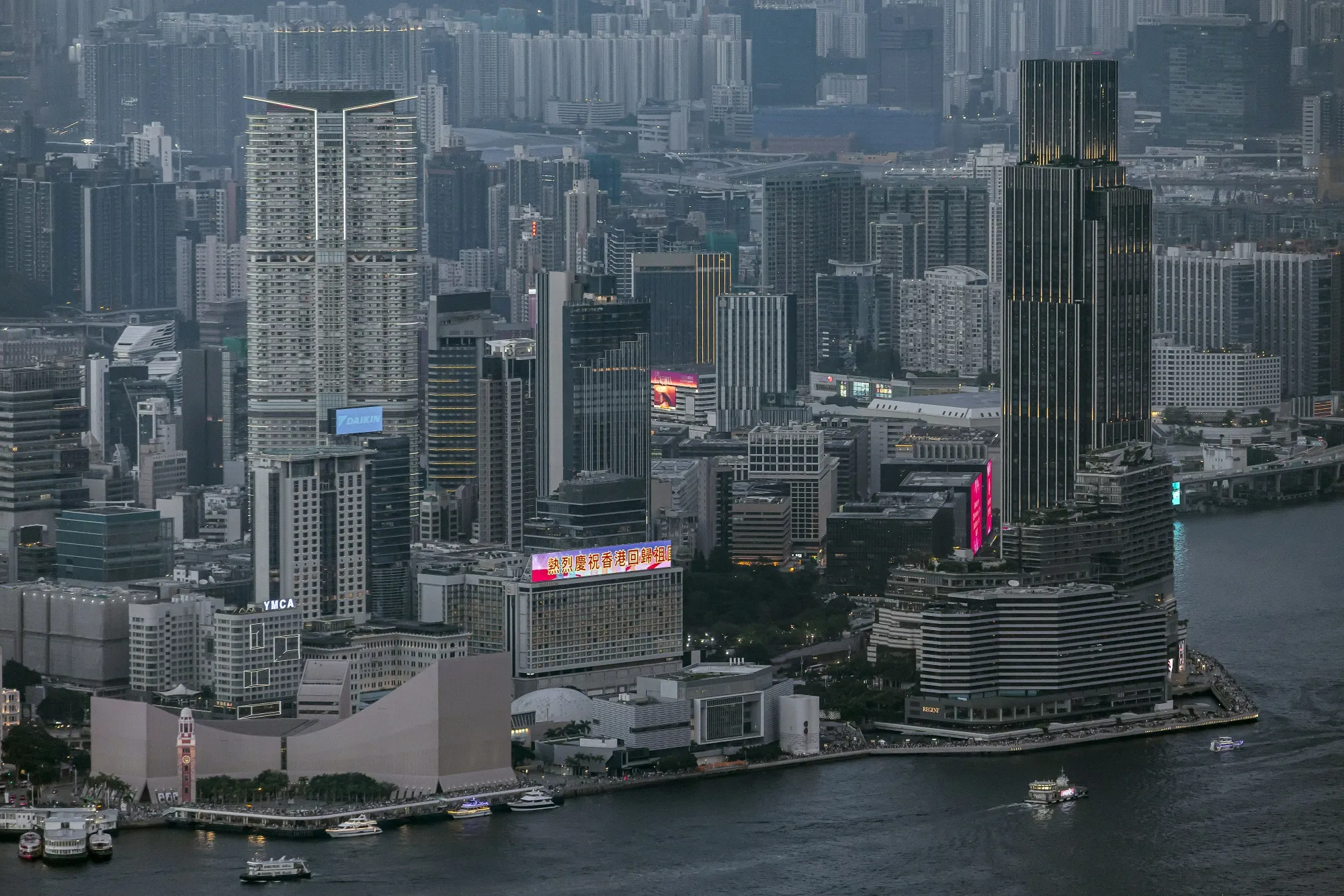 The Victoria Dockside commercial complex, developed by New World Development Co., right, in Hong Kong.