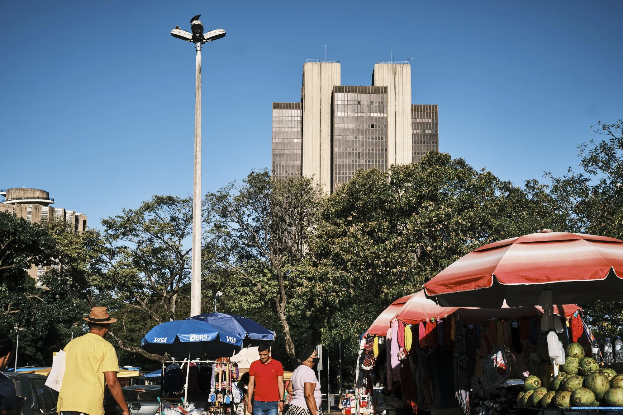 Street vendors in front of the Central Bank of Brazil headquarters in Brasilia, Brazil.