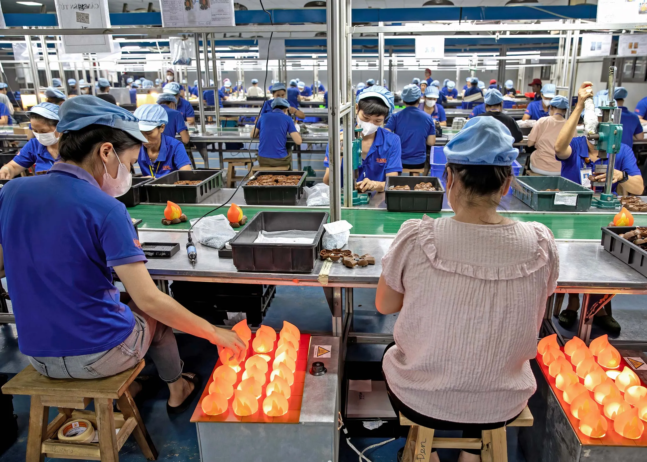 Workers assemble the Campfire Chatmallows Set for Learning Resources on the production line at the Dong Phuong Co. Ltd. factory in Ha Nam province, Vietnam.