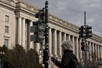 A pedestrian walks past the IRS headquarters in Washington, D.C.