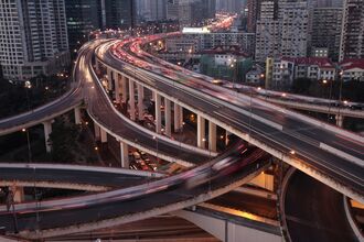 Shanghai's Roadways And Skyline Are Lit Up At Night
