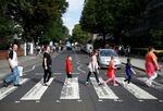 Fans recreate the iconic Beatles photo on Abbey Road in London.